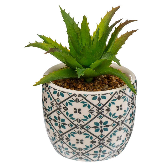 Floare artificială într-un ghiveci de ceramică