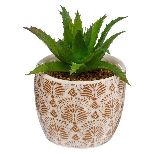 Floare artificială într-un ghiveci de ceramică