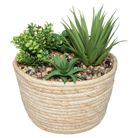 Plantă artificială într-un ghiveci bej